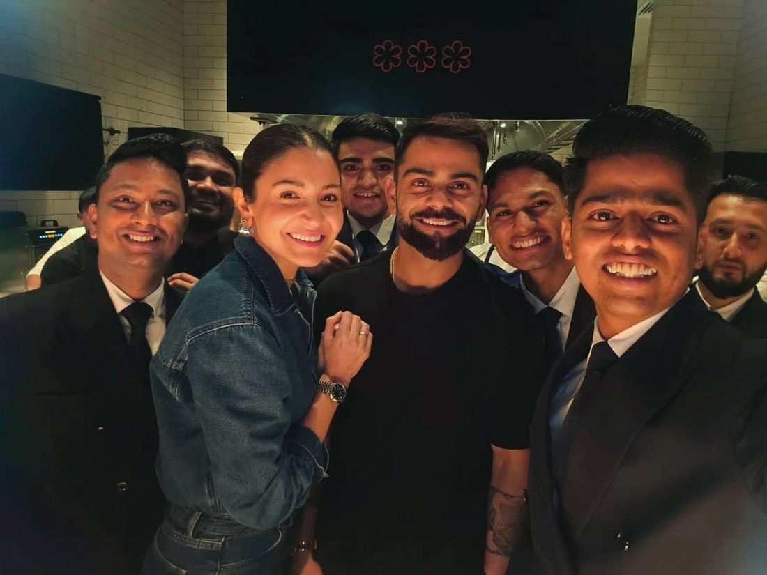 Virat Kohli & Anushka Sharma's Viral Dubai Holiday Photos: Heartwarming Moment with Hotel Staff Delights Fans